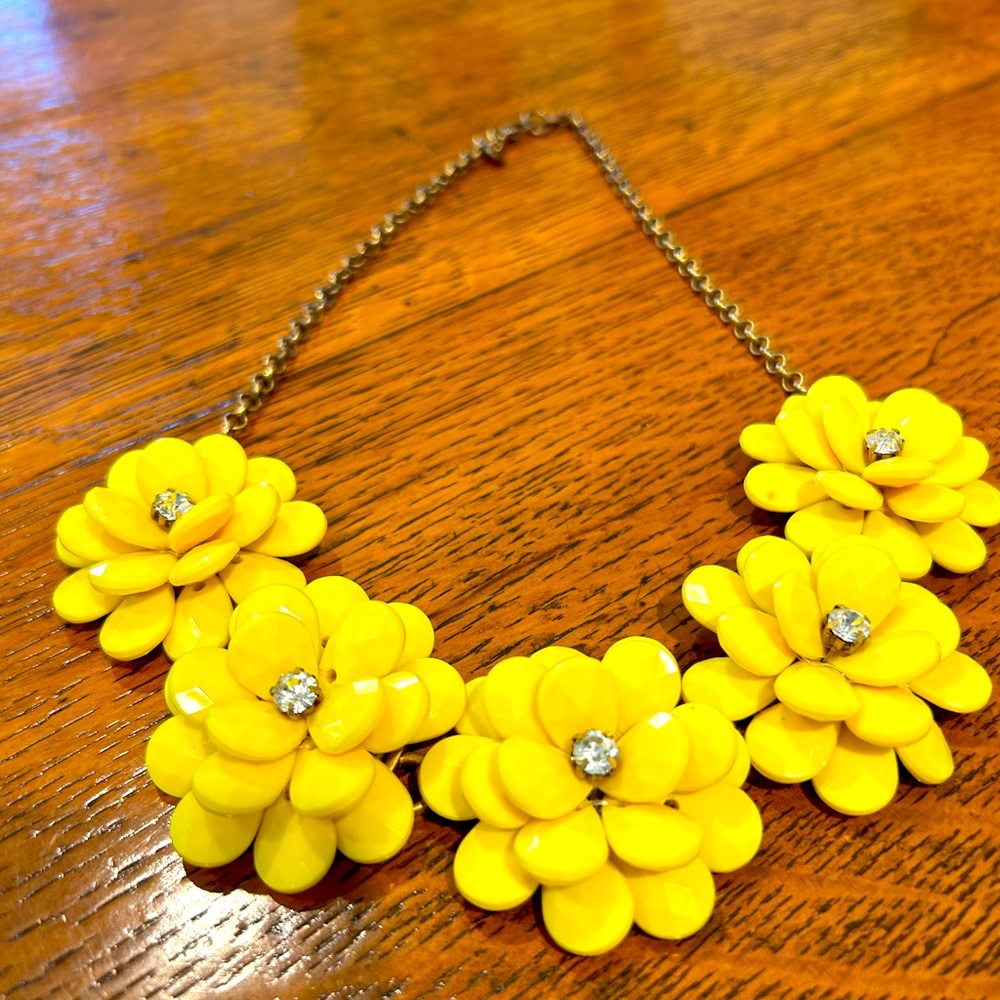 J.Crew five yellow flowers with rhinestones in the middle. Definitely retired!!